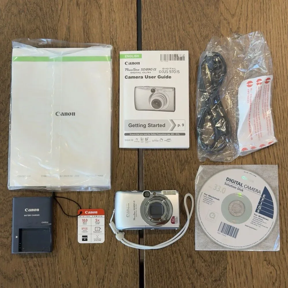Canon PowerShot Digital ELPH SD890 IS 10MP Camera Manual Charger Open Box Tested